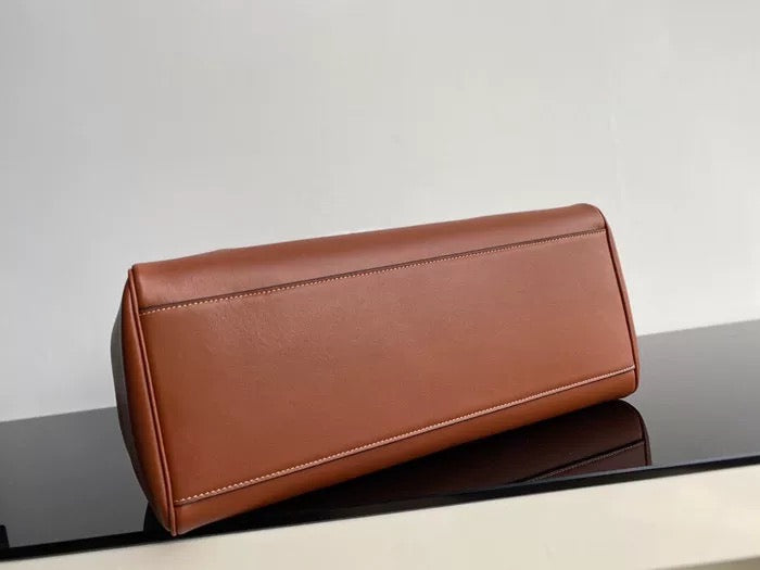 Cowhide shoulder bag