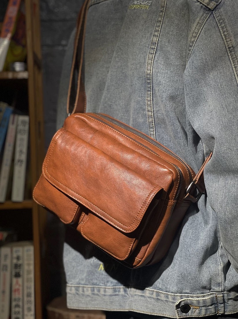 Brown cowhide camera bag