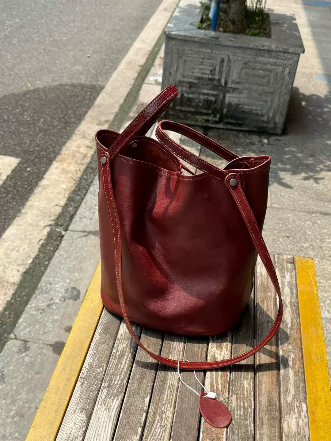 Matte leather bucket bag