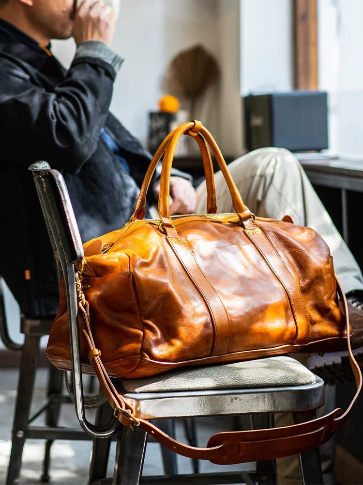 Vintage style shiny leather duffle bag