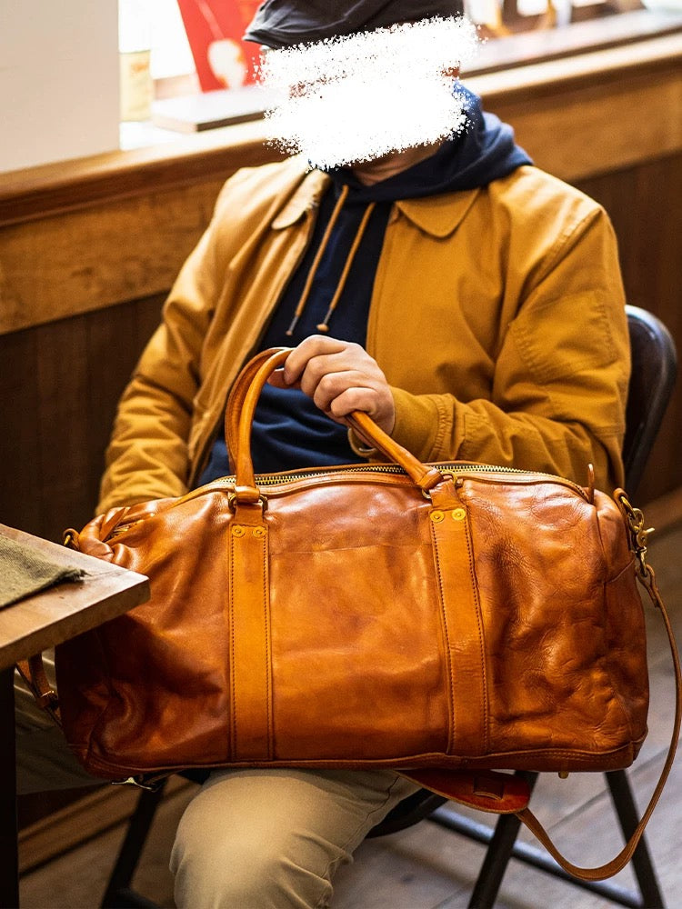 Vintage style shiny leather duffle bag