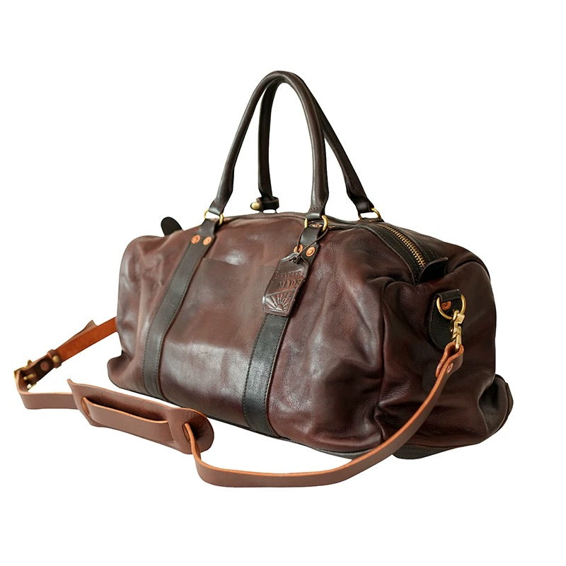 Vintage style shiny leather duffle bag